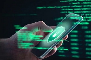 mobile in hand in green coding background